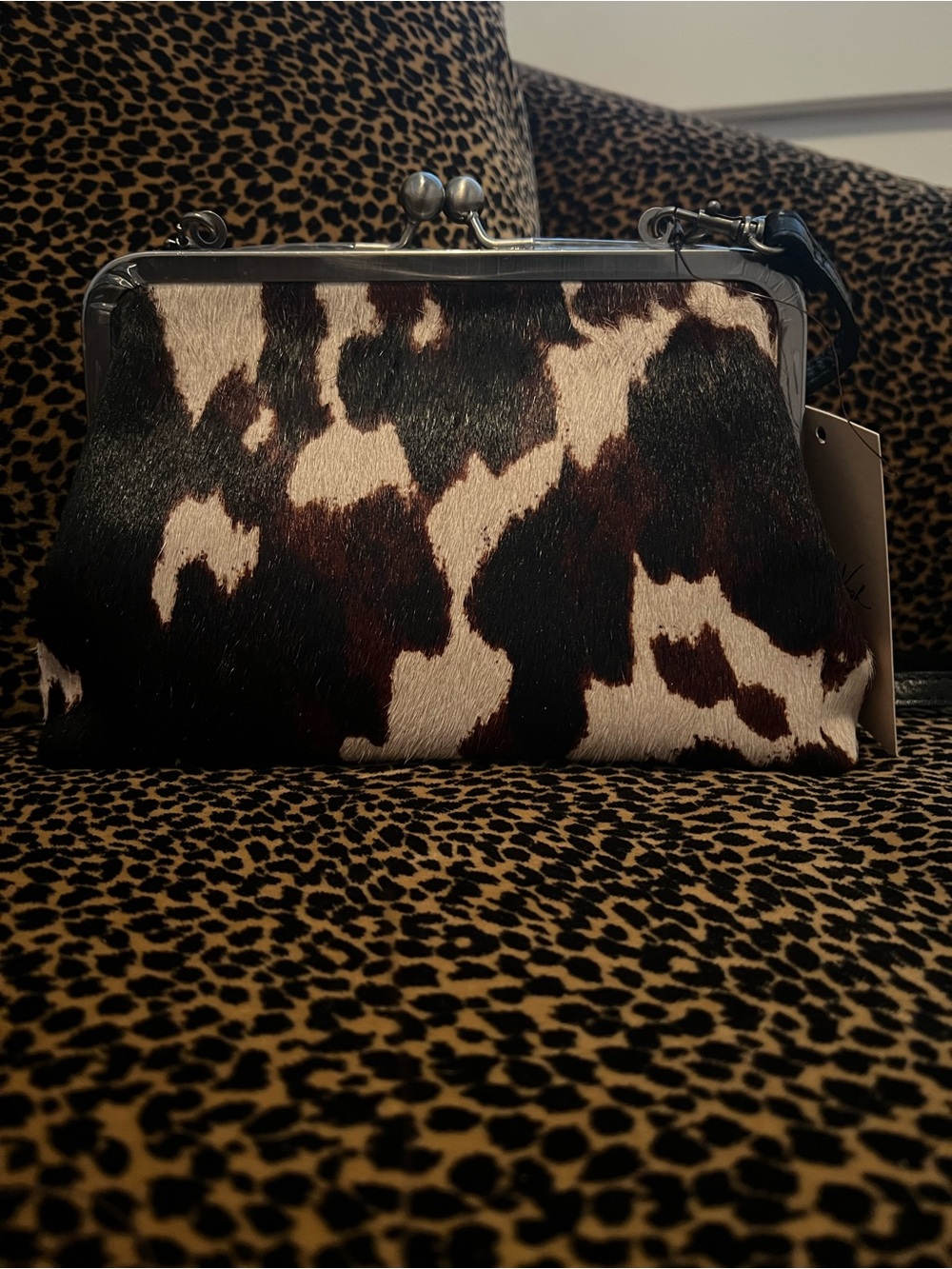 Patricia Nash Cavalino Collection .Cowhide Kiss-Lock Purse in Brown & White. NEW